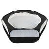 A black portable pet playpen with a white mesh top and base.