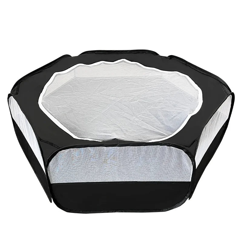 A black portable pet playpen with a white mesh top and base.