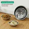 A stack of stainless steel pet feeding bowls for dogs and cats, with one bowl filled with kibble.