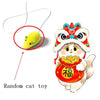 A colorful wall-mounted cat toy featuring a cute, stylized cat face with red and white fur.