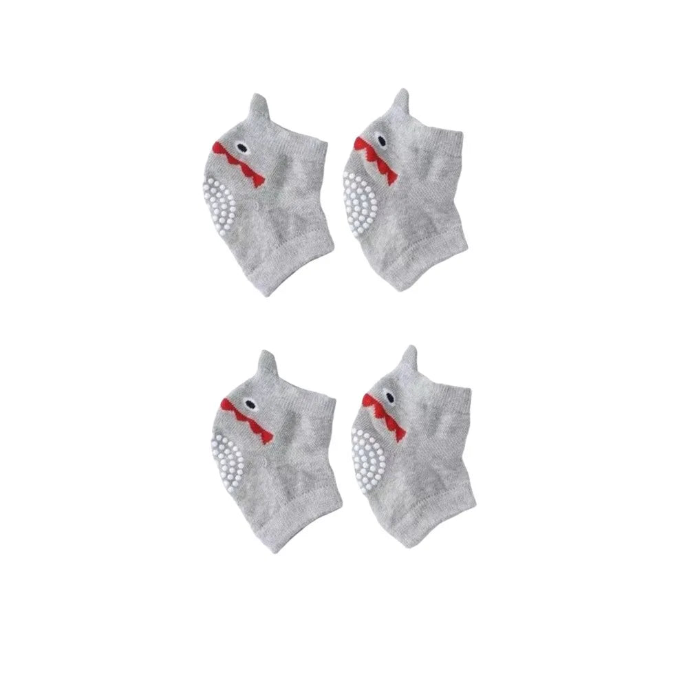 Pair of gray breathable dog knee pads with red accents for joint protection and floor traction