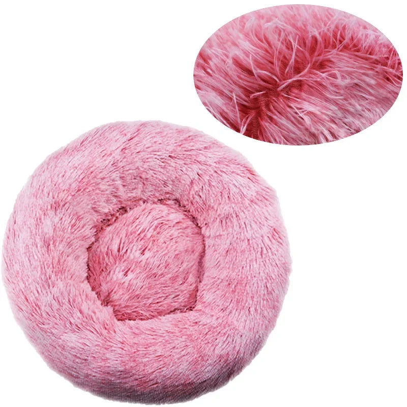 A pink ultra-soft plush pet bed for dogs and cats, shown in two circular views.