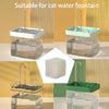 Clear glass water fountain with an activated carbon replacement filter and a stainless steel spout.