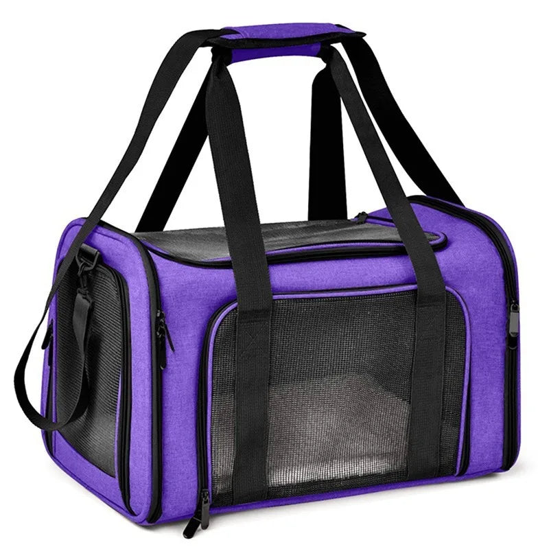 Purple portable pet carrier bag with black straps and mesh window
