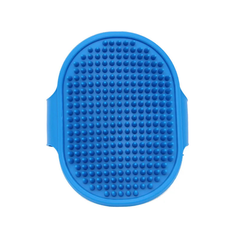 A bright blue, oval-shaped rubber grooming brush with numerous small bumps for pets.