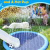A white dog is relaxing in a blue splash pad while water sprays from a nearby fountain.