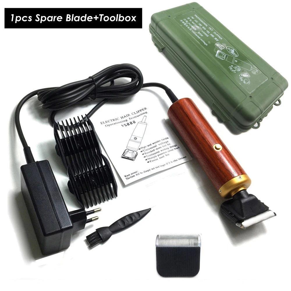 A green storage case containing a professional corded pet clipper, spare blade, and toolbox.