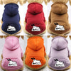 A collection of cozy fleece dog sweatshirts with hoods and pockets in various colors including navy, red, brown, orange, and 
