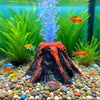 An aquarium volcano product showing a realistic erupting bubble effect with orange and black lava-like material.