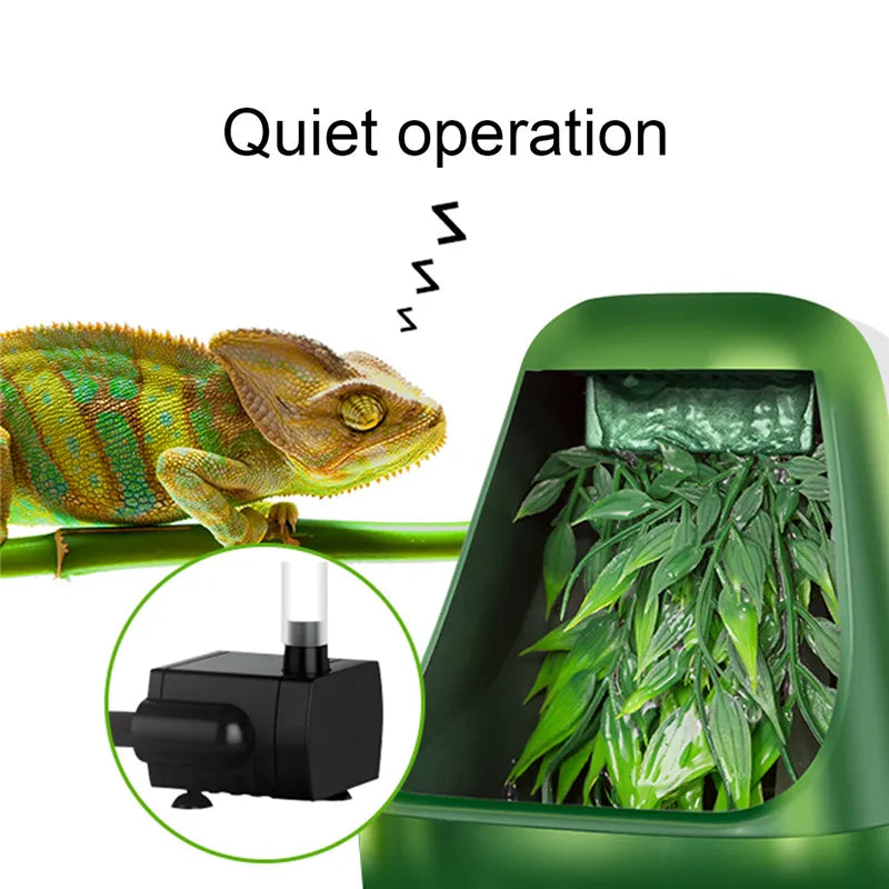A green reptile drinking water filter fountain with a leafy plant inside, demonstrating quiet operation.