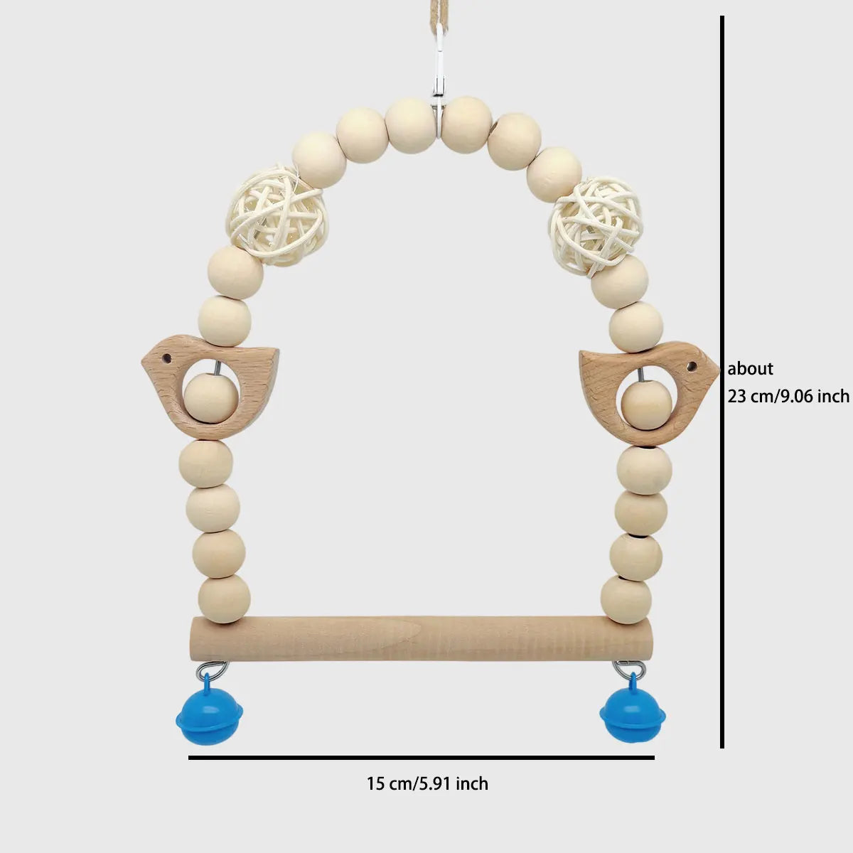 A wooden decorative parrot swing toy featuring a curved perch and hanging balls and nests.