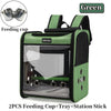 Green ventilated bird travel backpack with perch and feeding cups tray and station stick