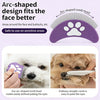 Purple arc-shaped grooming comb used on a dog's face for sensitive areas