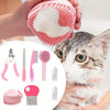 Un set de herramientas de peluquería para mascotas rosa, incluyendo una limadora de uñas, cepillo y otros utensilios, siendo 
