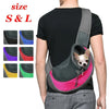 A person is wearing a breathable dog sling carrier for small pets, showing size options S and L.