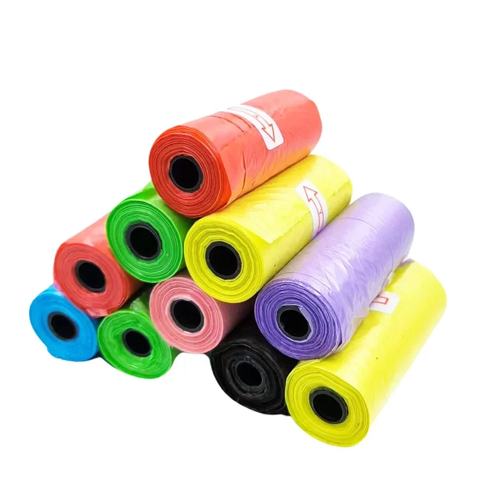 Rolls of reusable pet poop bags for dogs and cats in various colors like orange, green, and purple.