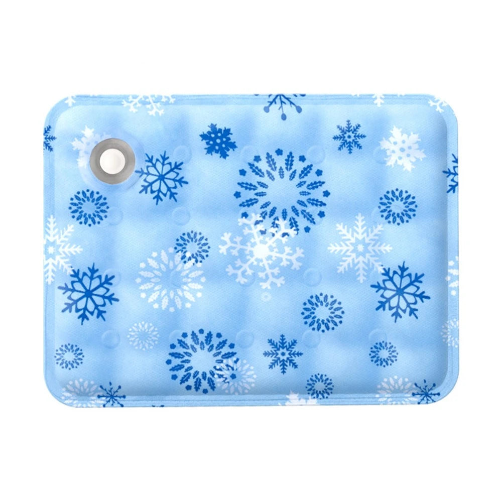 Light blue pet cooling mat for dogs featuring a pattern of white and blue snowflakes