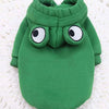 A green frog-themed pet sweater for dogs with large, expressive eyes.