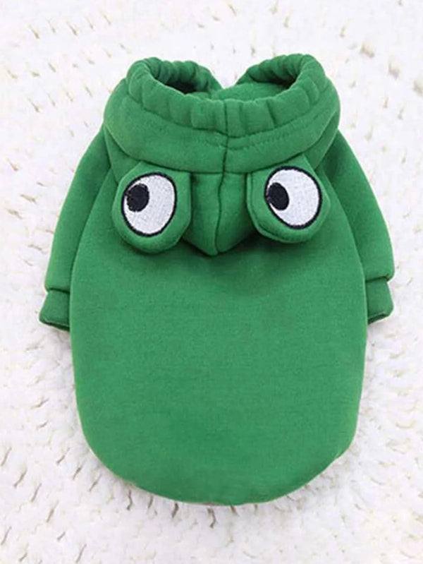 A green frog-themed pet sweater for dogs with large, expressive eyes.