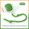Green automatic electric cat ball toy with a clear housing and a green cord for interactive play