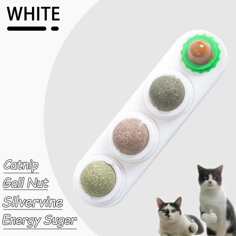White tray of catnip, gall nut, silvervine, and energy sugar licking balls for dental health and play.