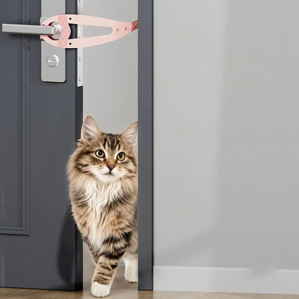 A fluffy tabby cat looks through a pink adjustable pet door stopper mounted on a gray door.