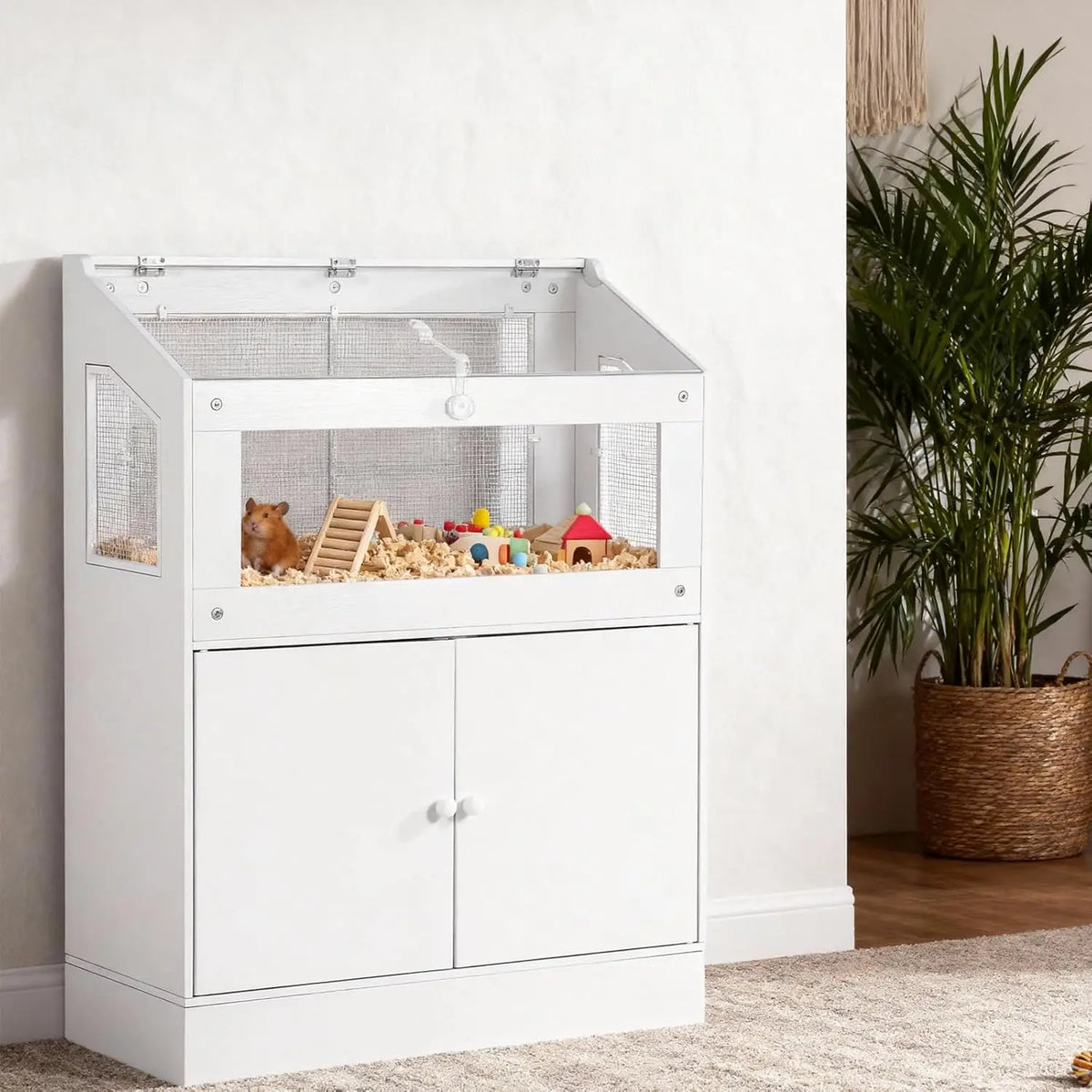 Weiße Acryl-Tierbehältnis-Käfig mit klarem Gehäuse und Aufbewahrungsbox auf Holzfußboden.