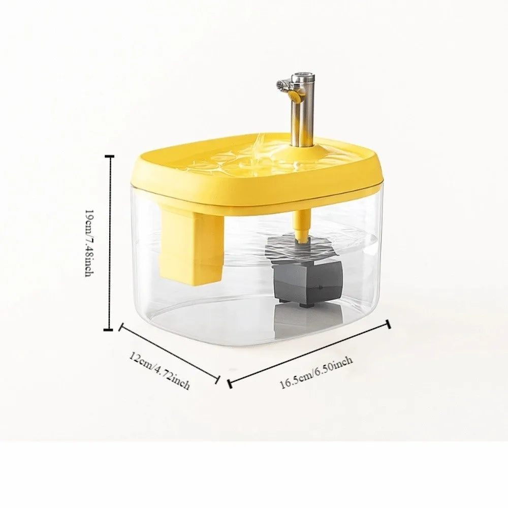 A clear glass cat drinking fountain with a yellow lid and a silver spout, shown from above.