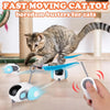 A gray tabby cat is interacting with several blue and white automatic pet toy cars designed for boredom busters.