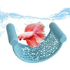 A vibrant red betta fish swims through a blue 3D printed floating hammock designed for aquarium decor.