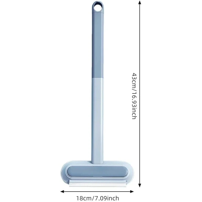 A light blue pet hair remover brush with a long handle and a flat cleaning base.