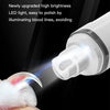 A close-up of a white electric pet nail grinder with an LED light illuminating blood streaks on a pet's nail.