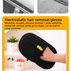 Black electrostatic hair removal glove being used on a hand for pet grooming