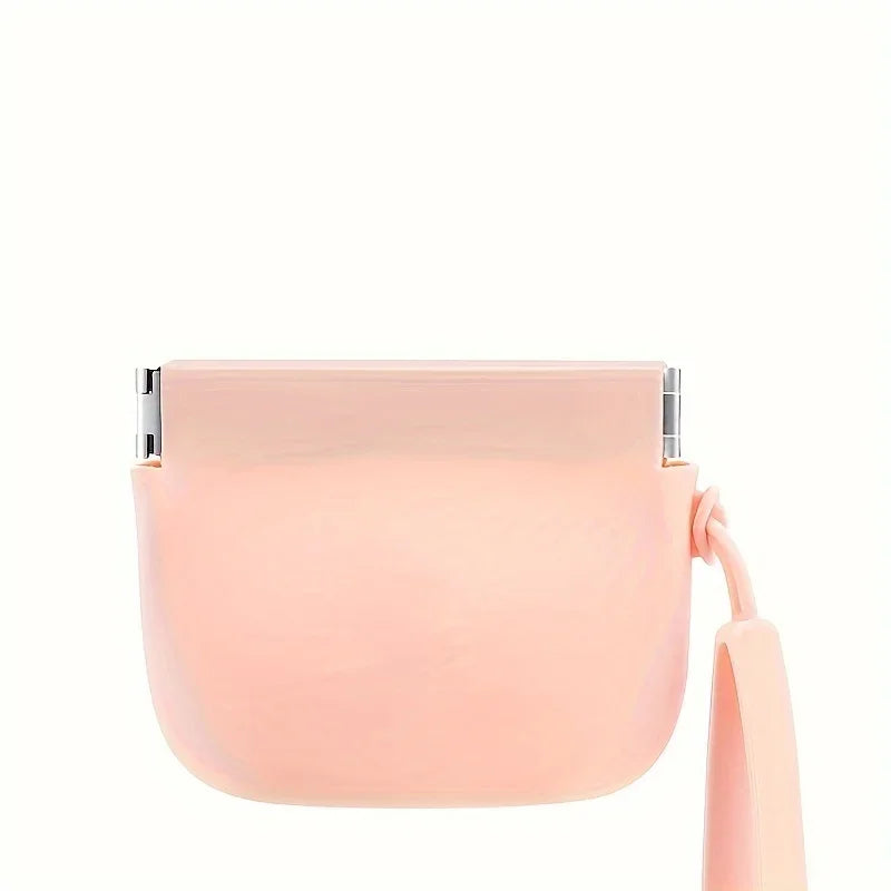 A pink portable silicone dog treat pouch for training and walks.