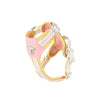 A pink and yellow adjustable no-pull dog harness with striped straps.