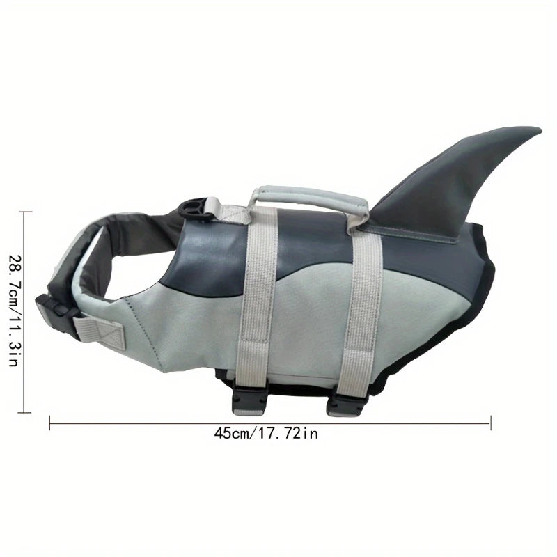Chaleco salvavidas gris y negro para perros de natación, mostrado plano con dimensiones.