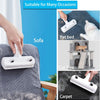 A white reusable pet hair remover brush is shown being used on a sofa, cat tree, and carpet.