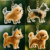 Ein Set von Welpenhaar-Gedächtnisketten mit realistischen goldenen und weißen Hundsilhouetten.