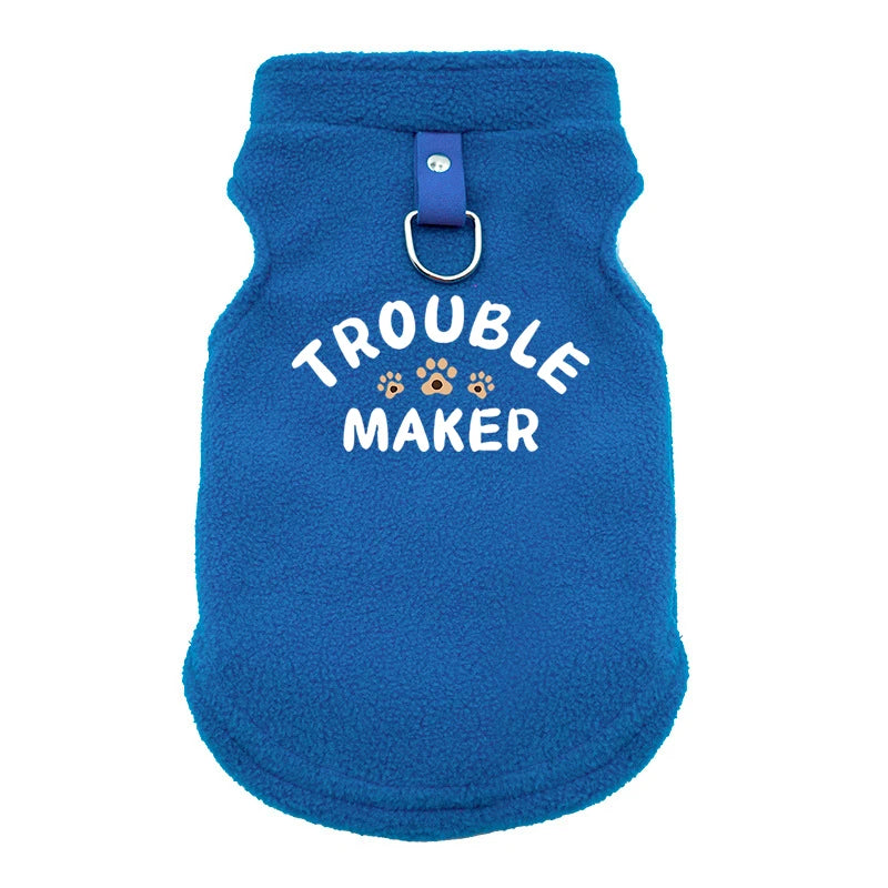 A bright blue, fuzzy pet jacket for dogs with a silver metal clasp.