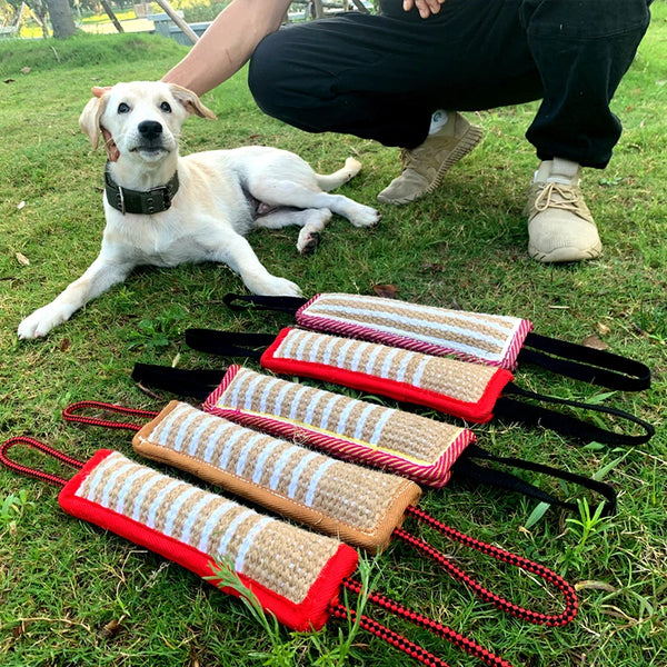 A set of durable jute dog tug of war training toys in red and black for canine exercise.