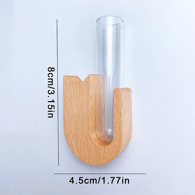 A wooden pet whisker collector vase with a clear glass tube, shown against a white background.