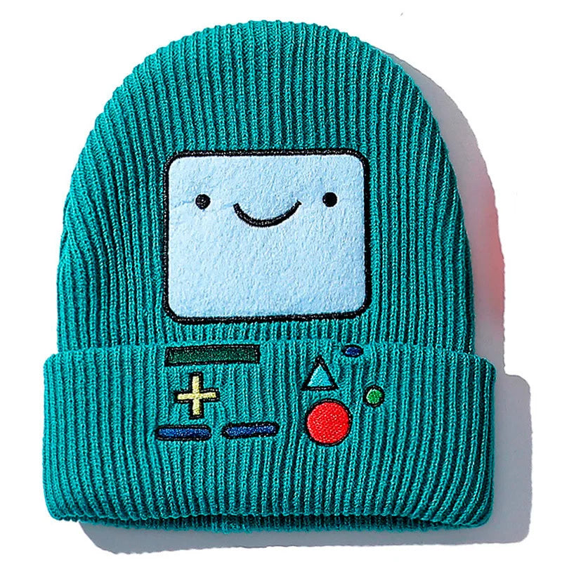 Türkis-gestrickte Strickmütze mit quadratischem Gesichtsdruck auf der Vorderseite.
