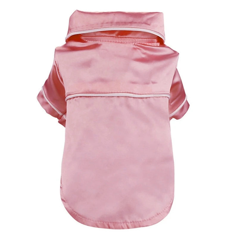 Pink luxury silk pet pajamas for a small dog shown from the back