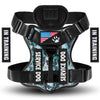 Black harness for a service dog with an adjustable fit and reflective features.