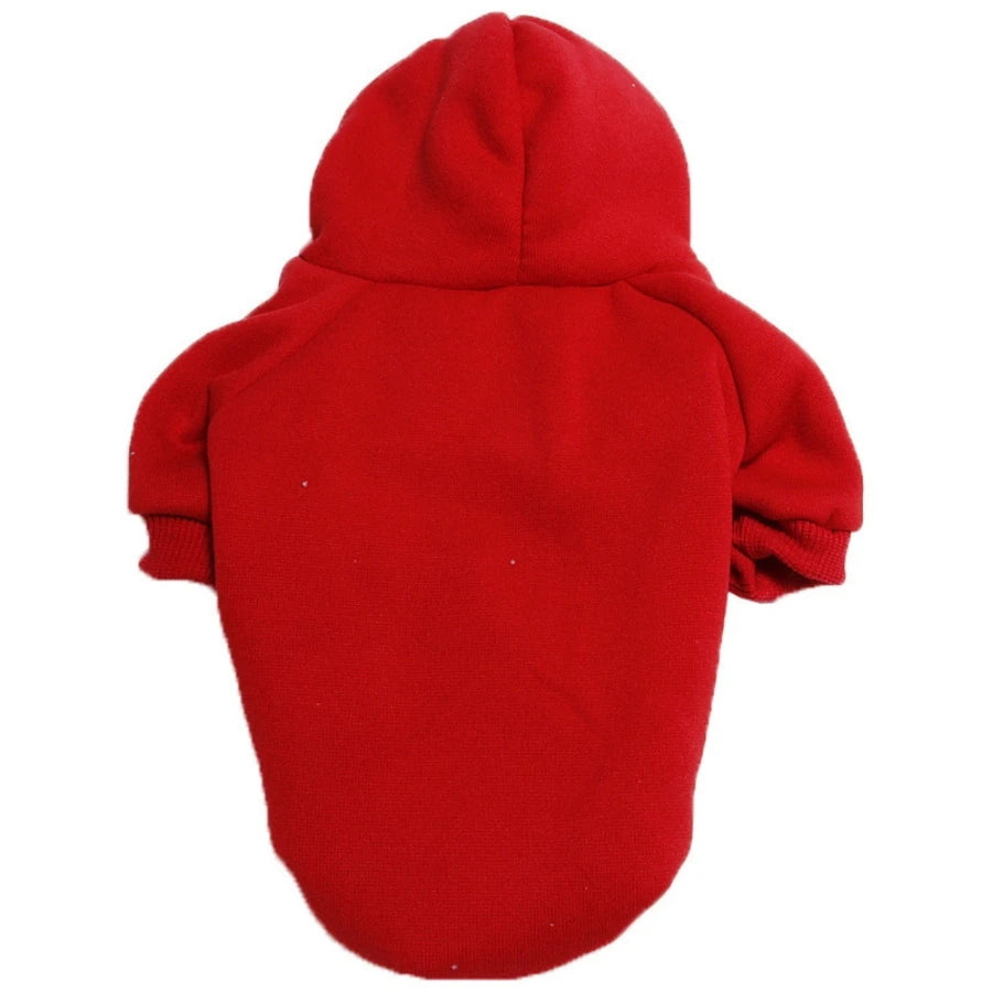 A bright red hoodie designed for dogs, shown flat lay.