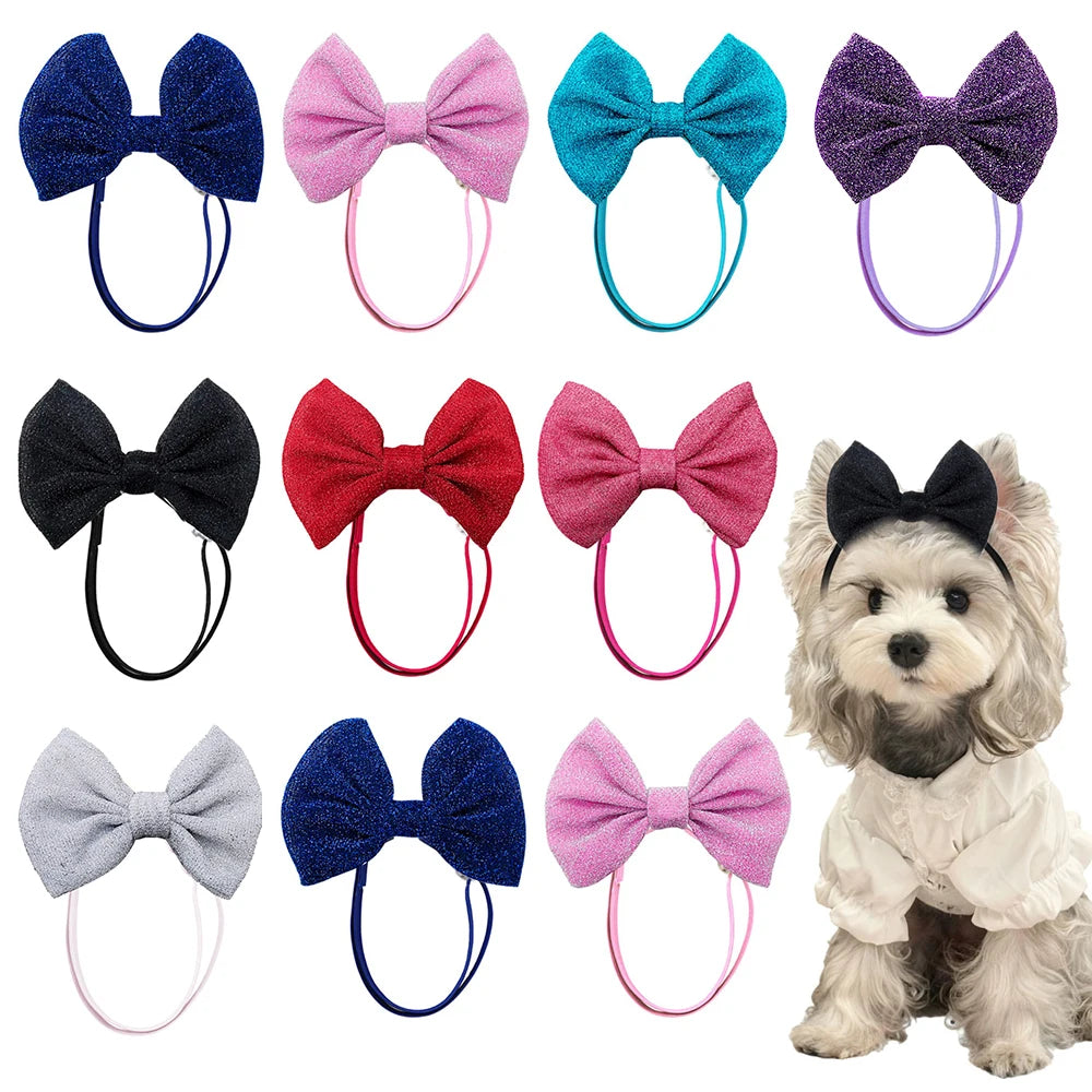 A collection of 30 handmade dog hair bow sets in various colors including blue, pink, purple, and black.