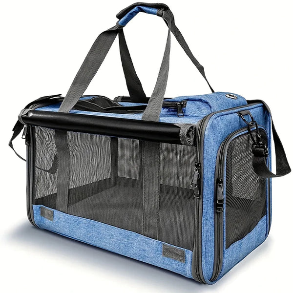 A blue breathable mesh pet carrier bag for cats and small dogs with black handles and a sliding top.