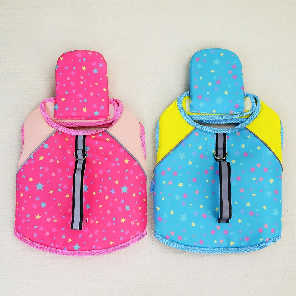 Two bright pink and blue dog summer life vest swim jackets with star patterns