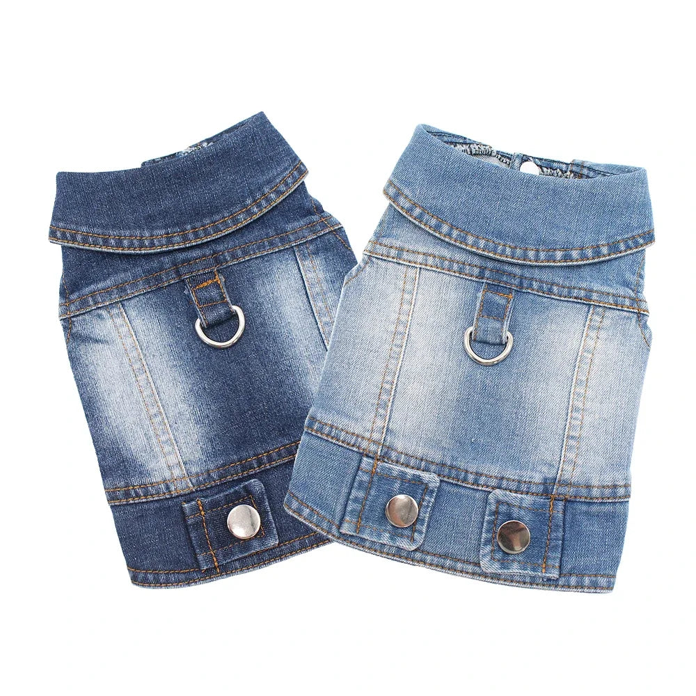 A pair of classic blue denim dog jacket with a D-ring leash attachment.