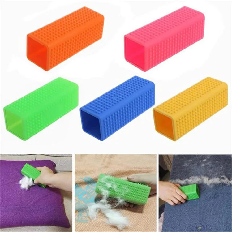 Various colored pet hair removal brushes with silicone bristles shown in use on a purple fabric.
